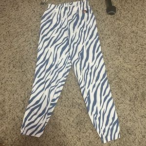 These sweatpants are Aviator Nation, they are white with blue zebra stripes, xs.